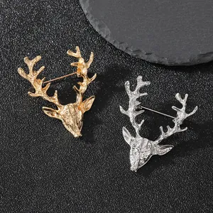 Zwei Vintage-Elchkopf-Broschen in Gold und Silber für Anzüge und Reversnadeln