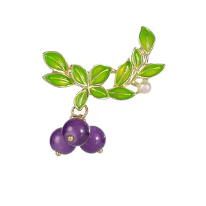 Exquisite blueberry brooch with green enamel leaves and purple berry beads on gold frame