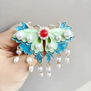 Pinza para el pelo mariposa de estilo chino con esmalte azul, perlas y borlas