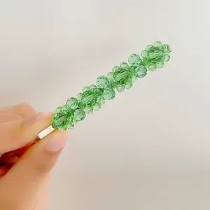 Elegant green crystal bead hair clip with polished silver metal finish for women