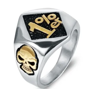 Retro stainless steel biker ring featuring 1%er gold skull emblem and black texture