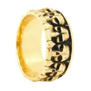 Golden punk skull ring in vintage stainless steel with black oxidized relief details