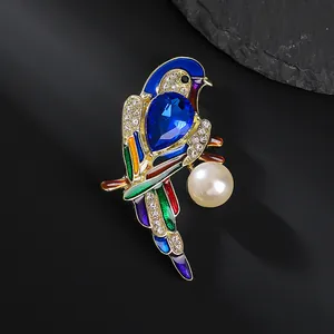 Exquisite parrot brooch with colorful enamel pearls and crystals on black stone