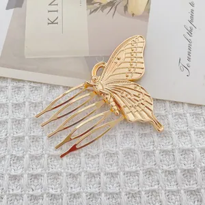 Detail of a golden 5-tooth metal hair comb featuring a delicate hollow butterfly design