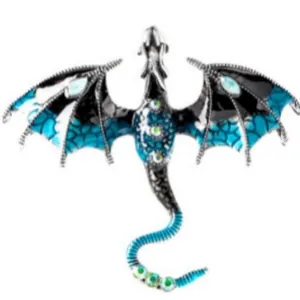 Vintage silver dragon brooch with blue enamel wings and inlaid emerald green gemstones