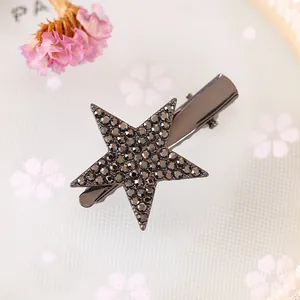 Stylish gunmetal star hair clip with glittering rhinestones and duckbill clasp