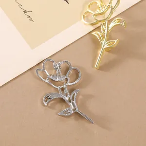 Élégante broche fleur de rose ajourée en métal doré et argenté pour costumes