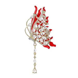 Broche papillon rouge luxueuse avec strass brillants et pampilles en cristal élégantes