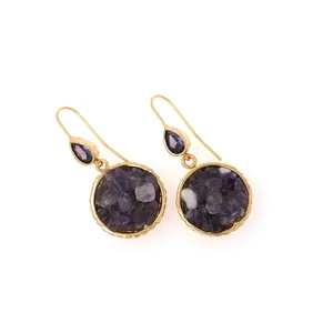Macro shot of 18K gold plated drop earrings featuring purple amethyst stones and zircons