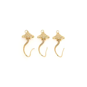 Trois pendentifs raie plaqués or 18 carats sertis de zircons étincelants