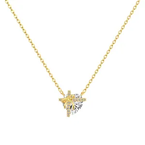 Collana in argento S925 con pendente a cuore in zircone e fiocco dorato lucido