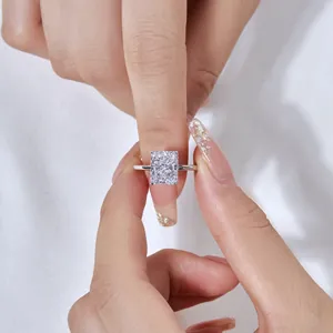 Close-up of cushion cut cubic zirconia ring with halo setting on a silver s925 band