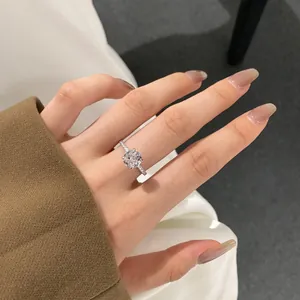 Detailed view of an S925 sterling silver ring with a round cut sparkling solitaire diamond