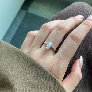 Oval cut S925 sterling silver ring featuring a sparkling radiant solitaire on a hand