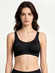 Detail of black seamless U-neck sports bra featuring fine vertical ribbed fabric texture
