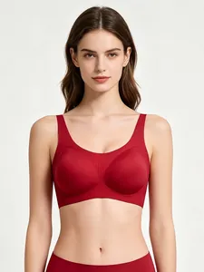 Close-up of seamless red U-neck wire-free bra set with vertical ribbed texture fabric