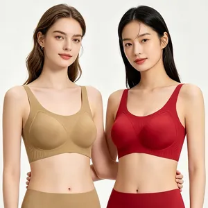 Detail of seamless jelly-strip wireless bras in khaki and deep red with U-back design