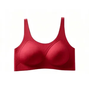 Seamless dark red wireless bra with molded cups and ribbed support details