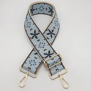 Ethnic style light blue and beige woven bag strap with dark blue floral embroidery