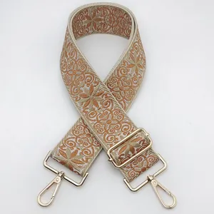 Ethnic embroidery strap in beige and orange with light gold adjustable buckles