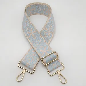 Ethnic blue and beige embroidered wide shoulder strap with golden metal hardware