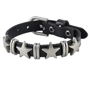Detail of punk black leather bracelet with silver stars and classic buckle closure