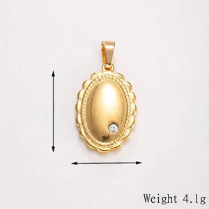 Detailed view of gold oval star pendant with zircon, measuring 23mm by 15mm size