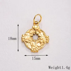 Detail of 18mm hammered gold star pendant with engraved size and 1.4g weight measurements