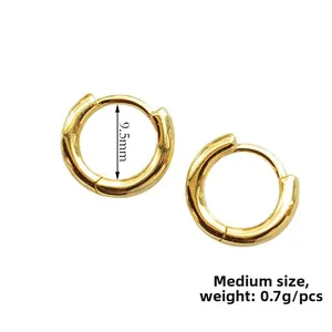 Medium size gold hoop earring detail with 9.5mm inner diameter and 0.7g weight