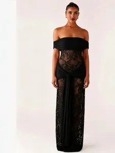 Elegant black lace off-shoulder long dress with sheer hollow-out waist and drapes