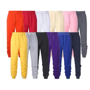 Detail of colorful fleece jogger pants with drawstring waist and ribbed cuffs
