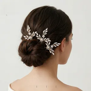 Detailed view of handmade bridal hair pin with adjustable pearl and crystal branches