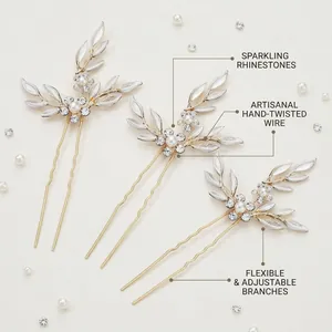 Three-piece bridal hair pin set with white leaves, pearls, and rhinestones in gold finish