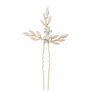 Elegant bridal hair pin with gold leaves, white pearls and sparkling rhinestones