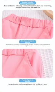 Dettaglio di pantaloncini in cotone rosa per bambina con vita elastica e sopraggitto