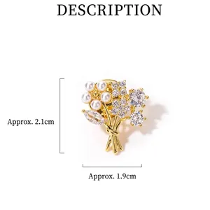 Exquisite gold flower brooch with white pearls and crystals, measuring 2.1cm by 1.9cm
