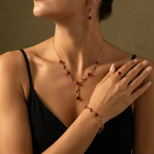 Detailed view of vintage rose jewelry set including necklace and bracelet on model