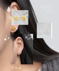 Detailed close-up of double-layer hollow flower stud earrings in silver and gold