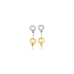 Detail view of gold and silver plated O-ring connectors with pins for DIY jewelry making