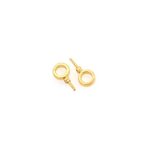 Detailed macro view of 18K gold plated circular connectors for DIY jewelry design