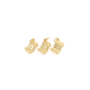 Macro detail of three 18K gold-plated dollar sign bill pendants with polished finish