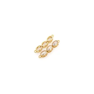 Macro view of 18K gold plated connectors with three oval zircon stones for DIY jewelry