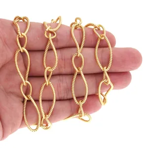 Detailed view of 18K gold-plated oval twist chain link for DIY jewelry making