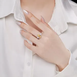Elegant S925 sterling silver ring featuring a large yellow pear-cut carbon diamond stone