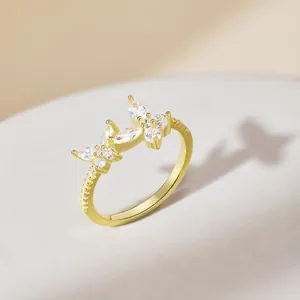 S925 sterling silver butterfly ring with marquise cut stones in gold plating