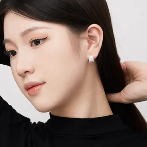 Elegant 925 sterling silver U-shaped hoop earrings with shimmering pave-set cubic zirconia