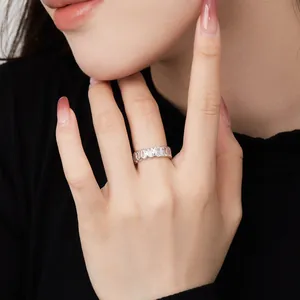 Eternity band with oval and rectangular cubic zirconia in S925 sterling silver worn on hand