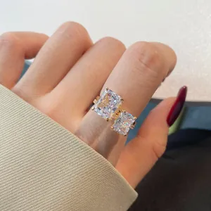 Macro detail of S925 silver ring in gold with double rectangular zircon stones