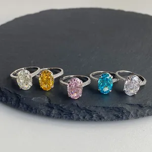 S925 sterling silver oval cut gemstone rings in five colors on dark stone plate