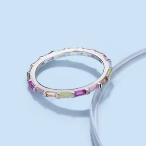 S925 sterling silver ring featuring multi-color rectangular zircon stones on a blue background